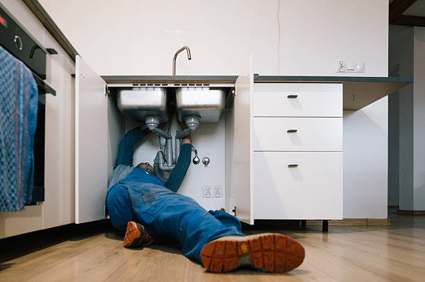 Professional Drain Cleaning technician working in Williamsburg, IA